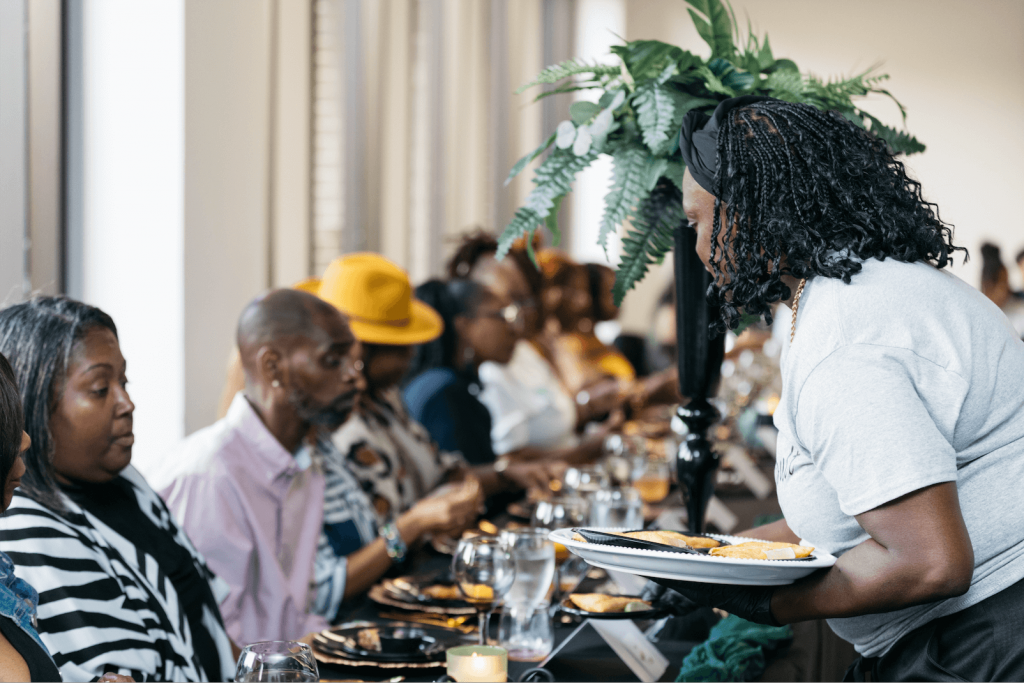 Guests being served food at Taste of Catapult Event