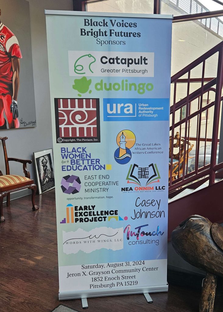 Sign featuring various sponsors of the Black Voices Bright Futures event