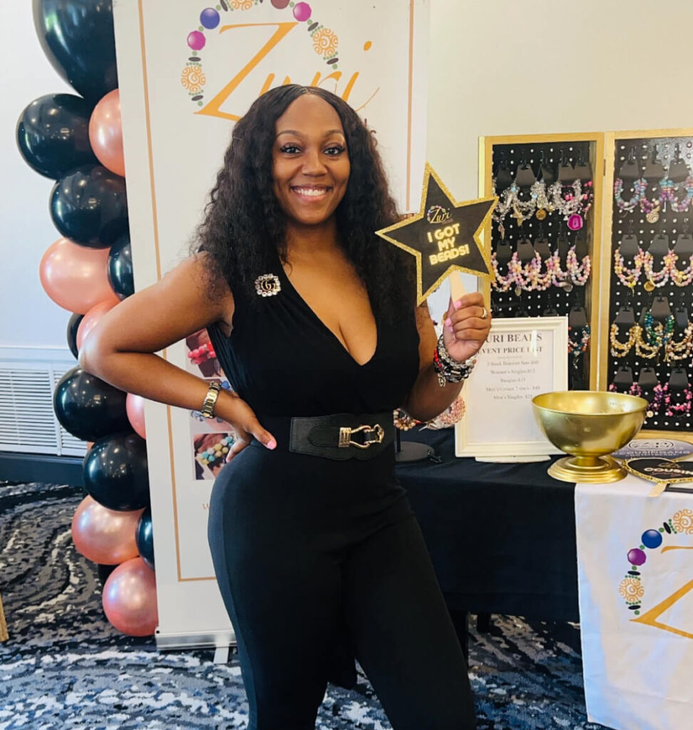Kecia Chantel in her storefront for her company Zuri Beads